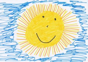 Von Kind gemalte Sonne am Himmel